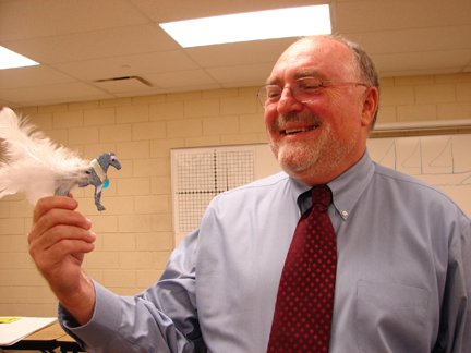 Dr. Lester Faigley holds a medium sparklepony