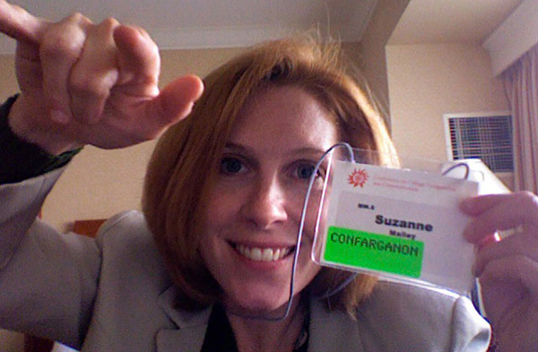 Suzanne Blum-Malley, Confarganon winner, holds up her name tag at CCCC