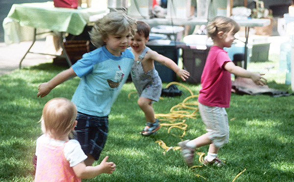 Children Playing Tag with Each Other