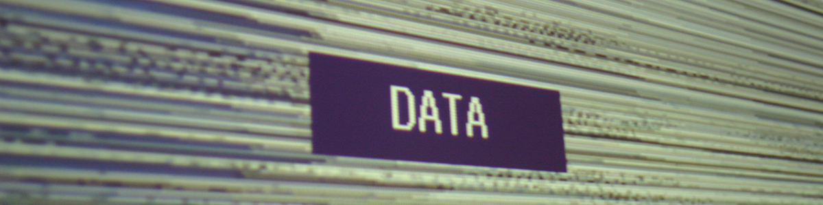 A grainy, grey-scale
              image depicts the word 'data'.