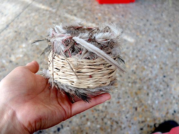 Basket with feathers
