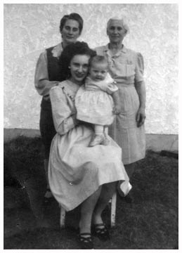 Olive with her mother, grandmother and baby