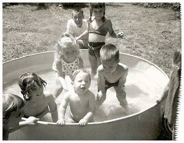 kids in a kiddie pool