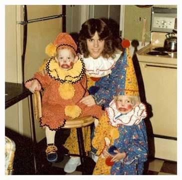 woman and children in clown costumes