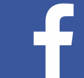 Facebook logo of the white lower case letter f super-imposed on a blue field