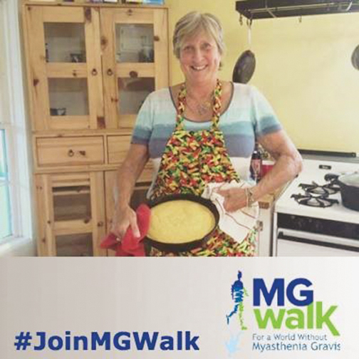 A photo shows a woman in an apron holding up a cake. Below the image a banner reads: #JoinMGWalk, for a world without myasthenia gravis.
