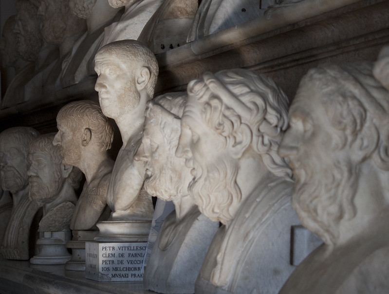 Two shelves of marble busts of Roman philosophers from the Capitoline Museum in Rome