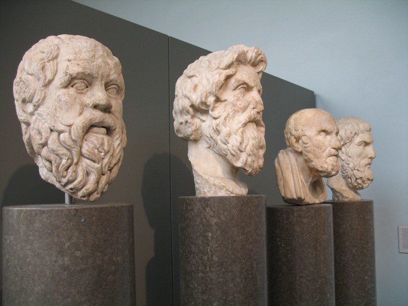 four busts of Greek philosophers