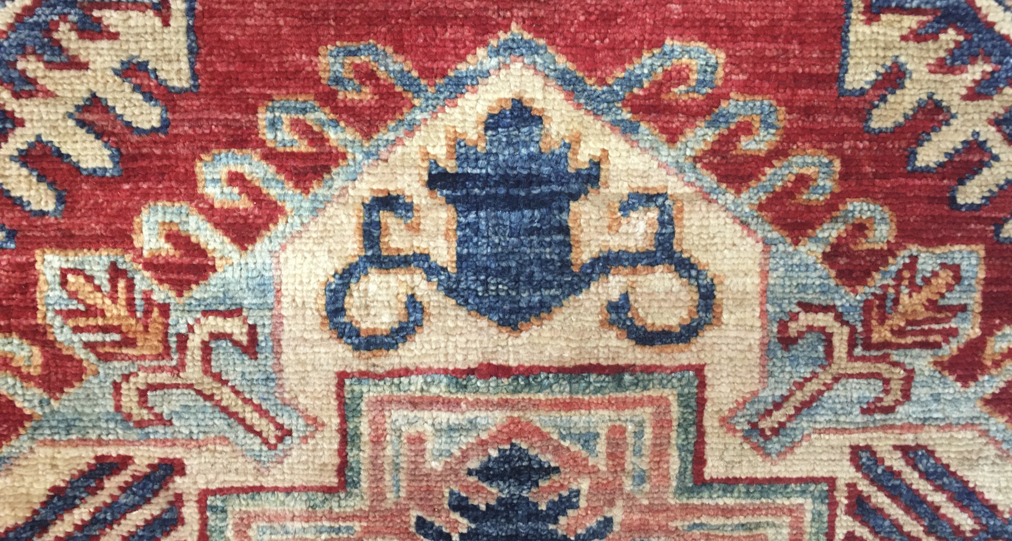 Detailed photo of symbolism woven into the rug