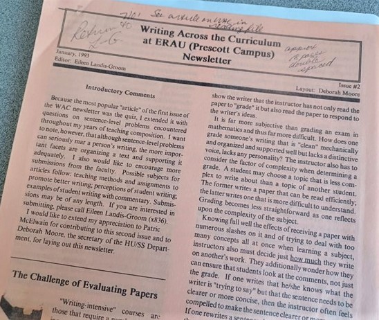 Photograph picturing the first page of the January 1993 WAC Newsletter: two columns of text printed on orange paper.