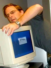 Anderson robs Peter to pay Paul, connecting an IBM monitor to an iMac CPU.