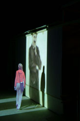 Image of Charlie Chaplin looking down at a potential visitor to the CompuObscura. Taken by Cal Poly Architecture class students using class-created model and slide projector, Spring 2004.