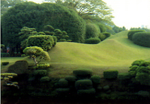 Carefully tended Japanese garden, repsenting the entire geography of the Japanese main islands in one small park. Shot #1. Beppu, Japan. Photo by David Gillette  2005.