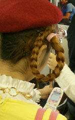 A young Japanese girl learning how to use her new anime-themed ketai. Tokoyo, Japan. Found at: http://www.thefeature.com/article?articleid=100130